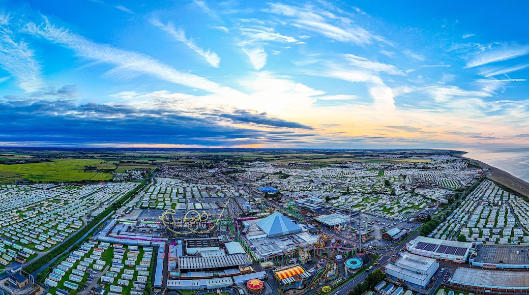 Sunset Aerial Panoramic View of the UK Seaside Ingoldmells, a busy tourist town with something for everyone, from stunning campsites to a sunset to die for, showcases the beauty of a serene sunset