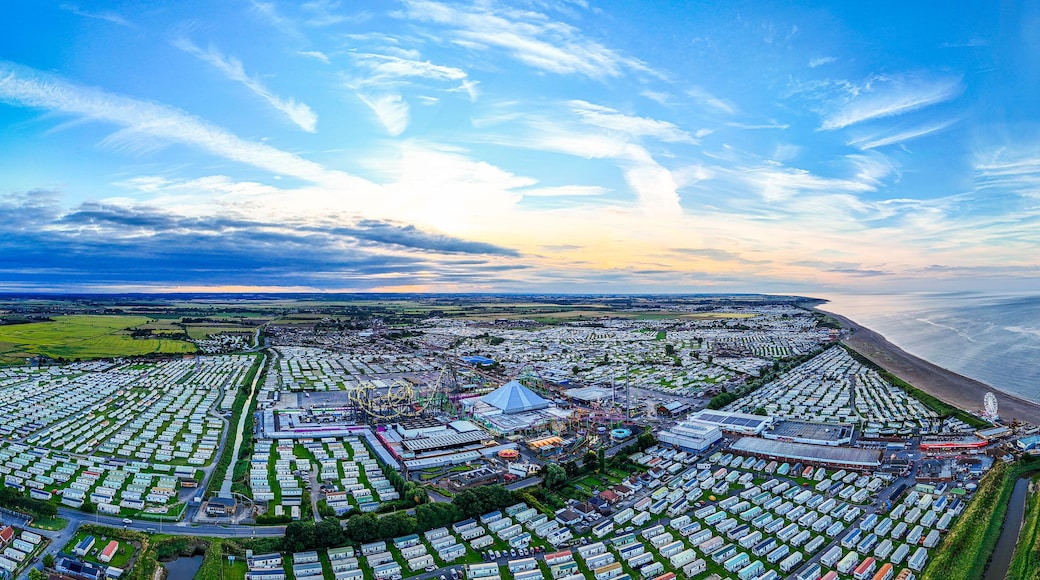 Sunset Aerial Panoramic View of the UK Seaside Ingoldmells, a busy tourist town with something for everyone, from stunning campsites to a sunset to die for, showcases the beauty of a serene sunset