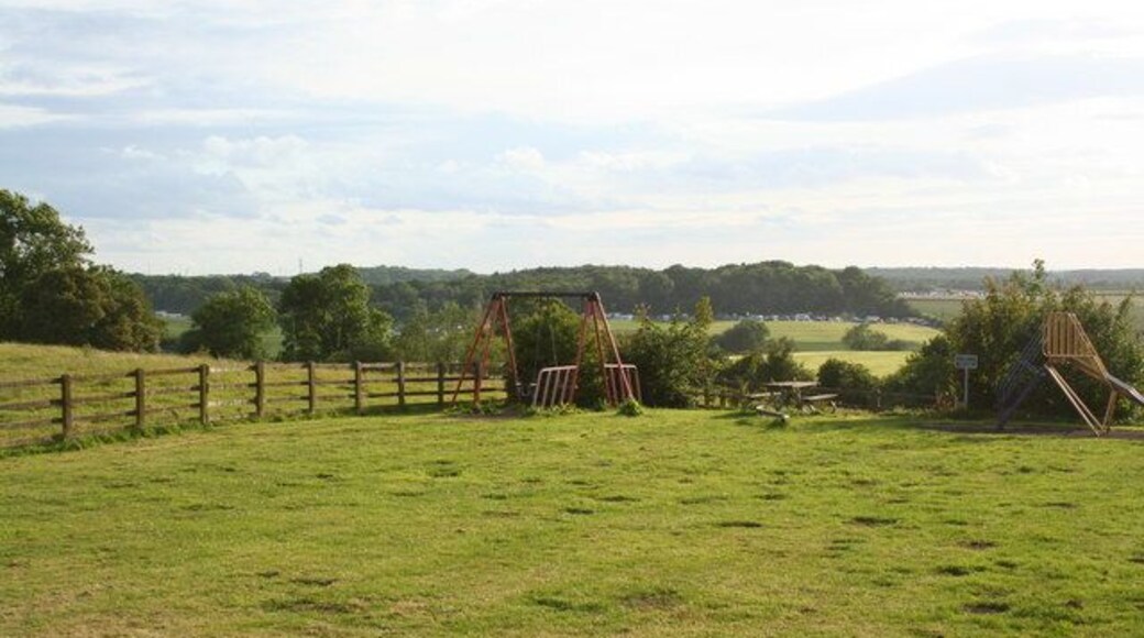 Whittlebury The view from Whittlebury across to Silverstone. The caravans in the fields are accommodating motor racing fans for the British Grand Prix.