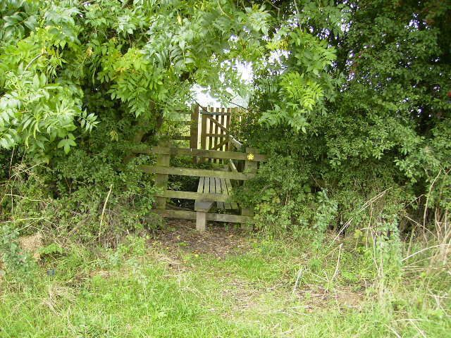 Gated & stiled footbridge near Flamingo Land.