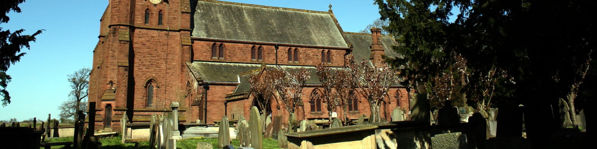 St John the Baptist parish church, Aldford, Cheshire, seen from the south