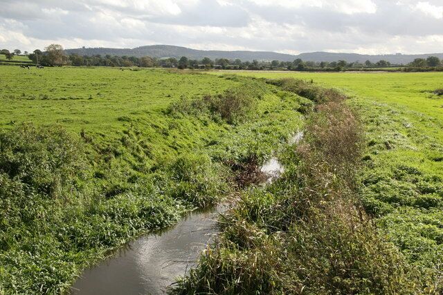 River Gowy and its plain near Huxley The River Gowy and its plain looking to the Peckforton Hills where it rises close to the source of the River Weaver. While the Weaver flows south initially, the Gowy flows north and for several miles provides the valley used by the Shropshire Union Canal. It runs just to the east of Chester and passes under the Manchester Ship Canal to meet the Mersey near Stanlow.