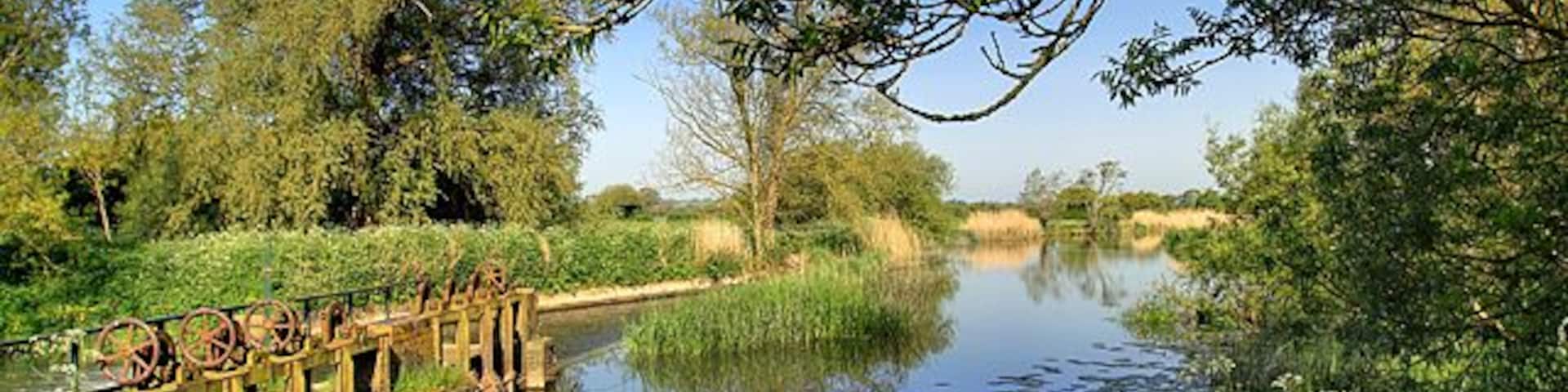 The Sluices and Weir at Cutt Mill A view looking upstream from alongside the mill building.
