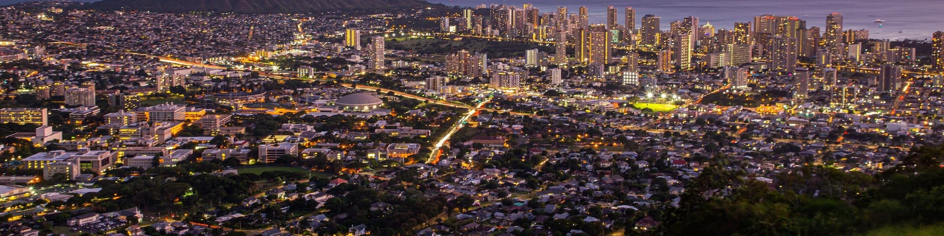 Waikiki featuring landscape views, a sunset and a city
