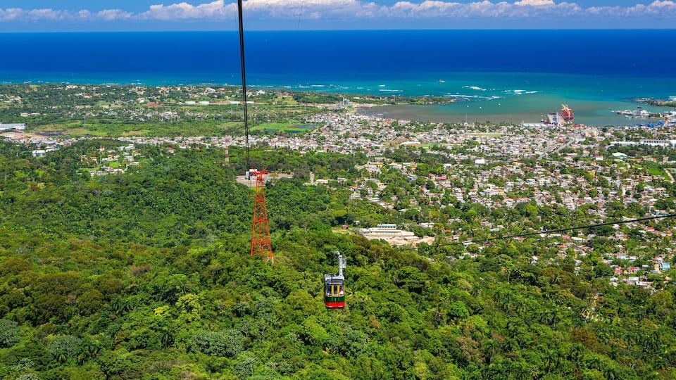 Puerto Plata showing a city, general coastal views and a gondola