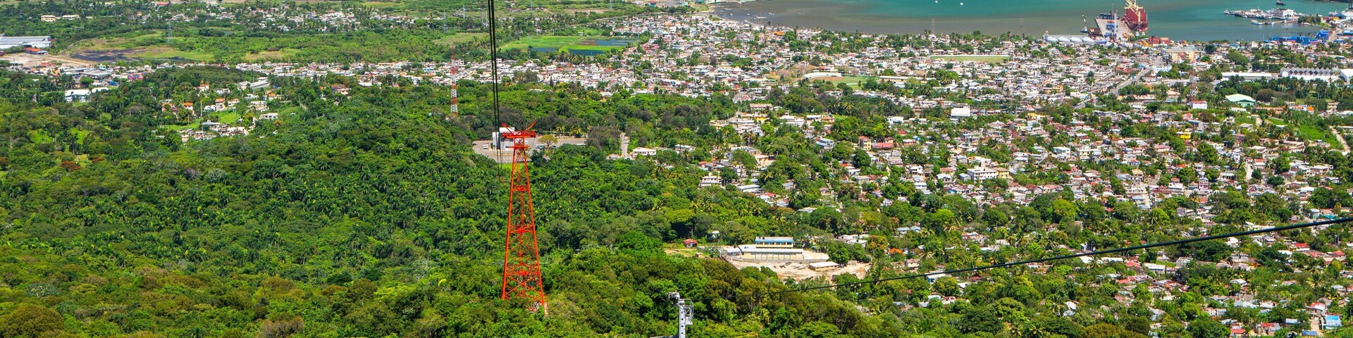 Puerto Plata showing a city, general coastal views and a gondola