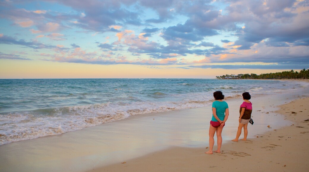 Puerto Plata featuring a beach as well as a small group of people