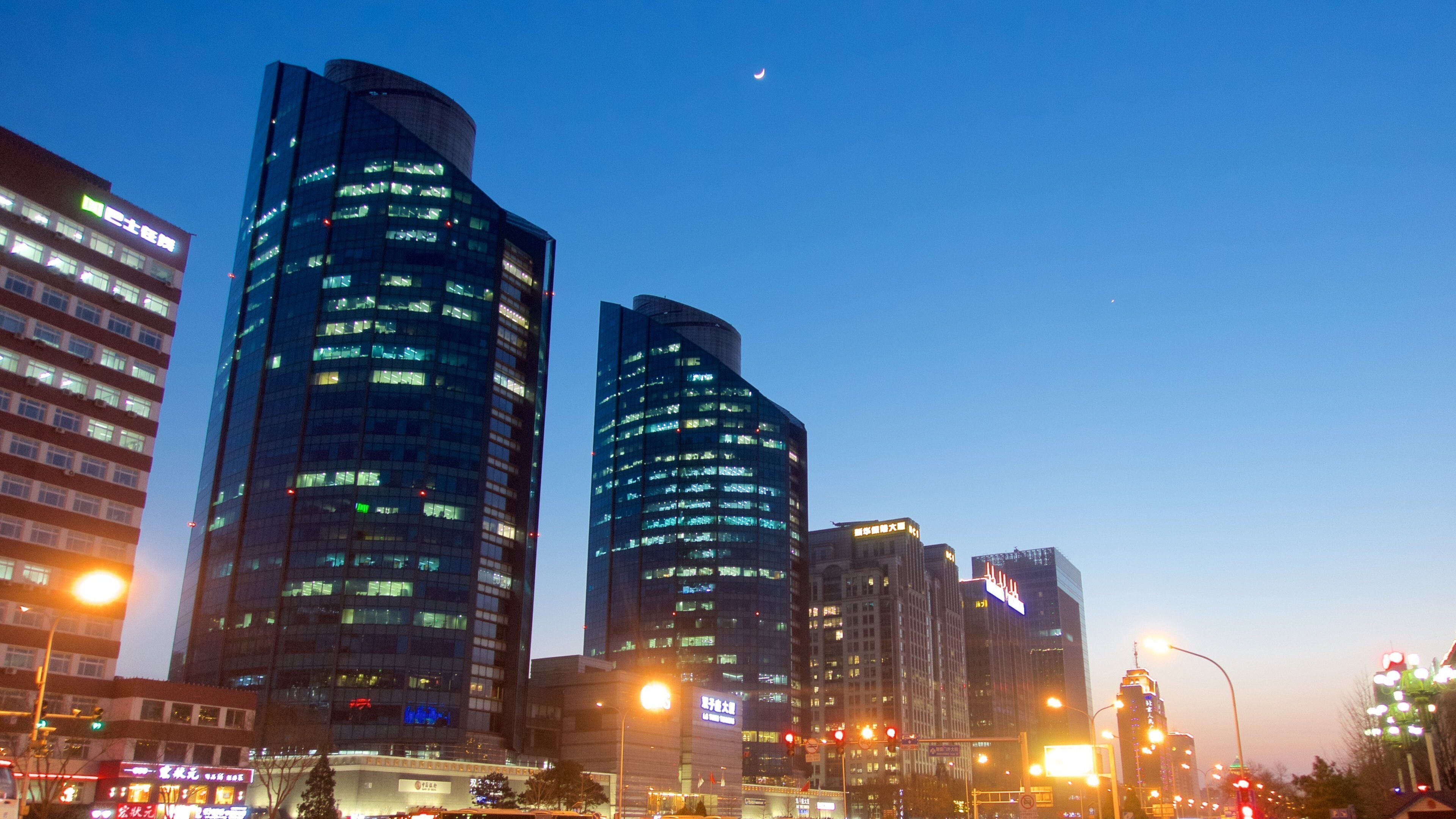 South Chaoyang showing night scenes, a skyscraper and a city
