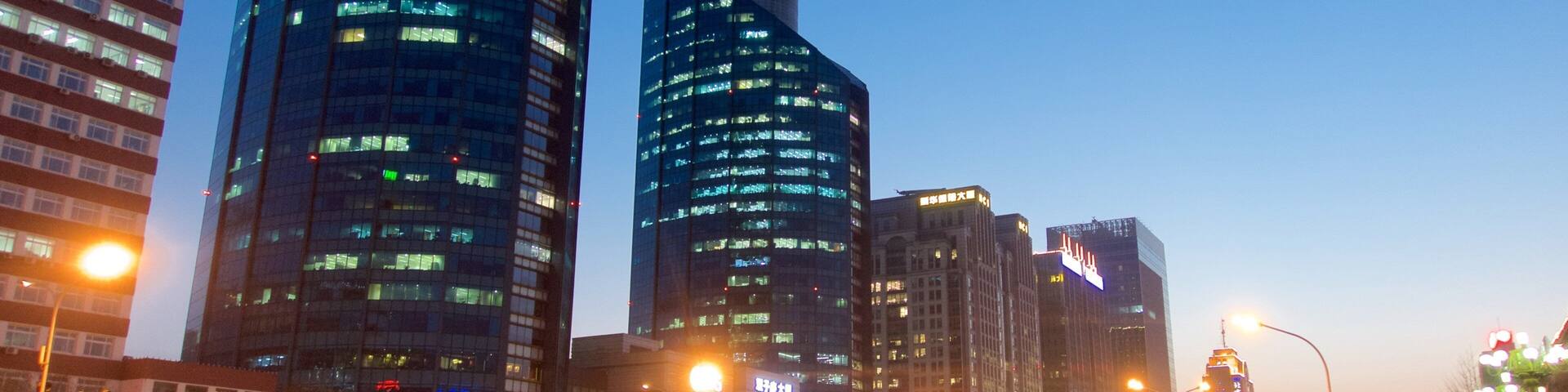 South Chaoyang showing night scenes, a skyscraper and a city