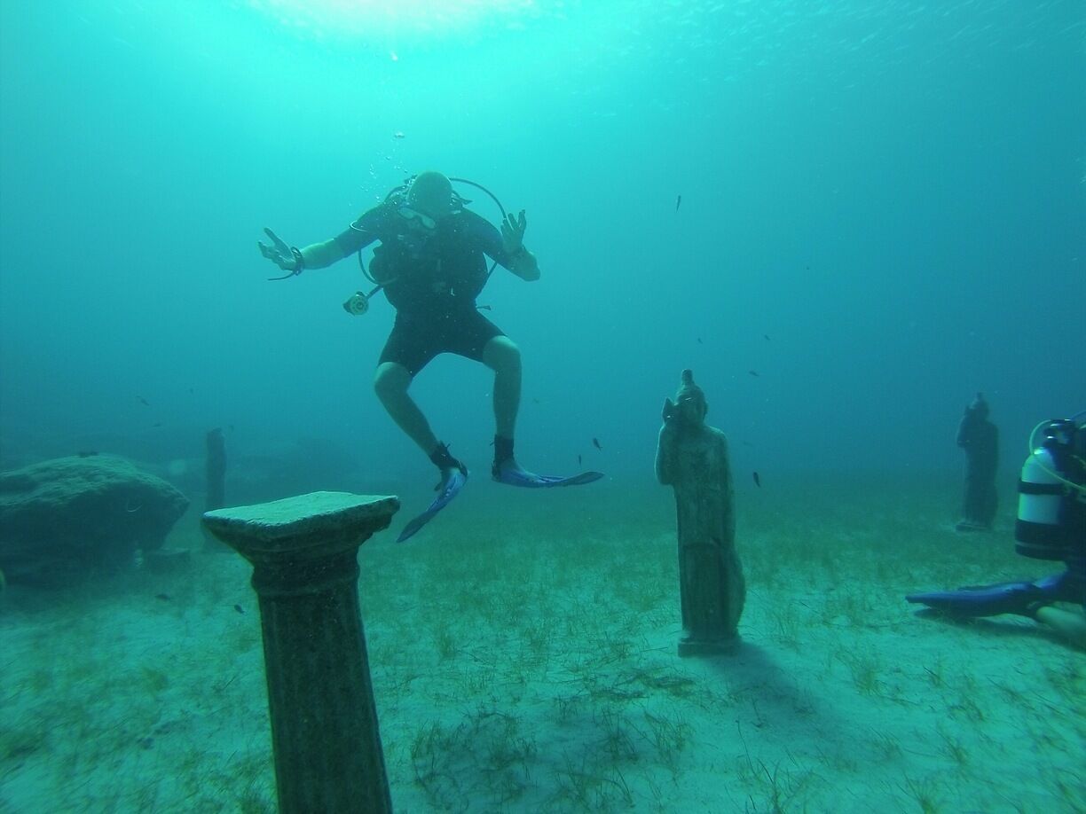 Diving is popular out at Green Bay on the edge of protaras resort, it's a shallow dive filled with fish and a pinnacle of loads of purpose built statues and columns! 