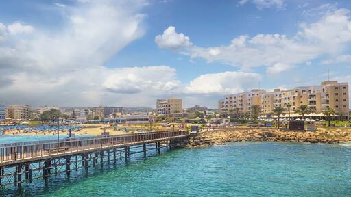 The pier and the beach of Protaras on a sunny day.