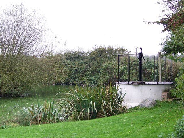 Village Pump, Bempton, East Riding of Yorkshire, England. Villagers obtained water from the village pump, the source being a spring beneath the well. The well and pump were restored in 2000.