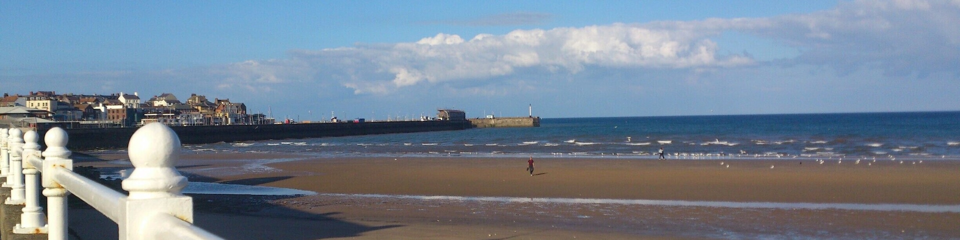 Bridlington is a great example of the wonderful British seaside. With 2 beaches - pebble beach to the north of the town, and this sandy beach to the south, separated by the harbour, there's donkey rides, speed boat rides, a funfair, fish and chips a plenty and icecreams galore.
This beach has great facilities for toilets, sowers and snacks and of course you can hire a traditional stripy deck chair and the usually essential windbreak!
#YorkshireDay