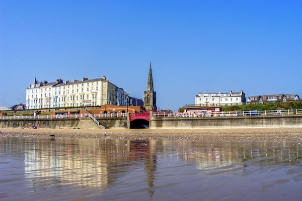 Lovely sandy beach with reflection.
