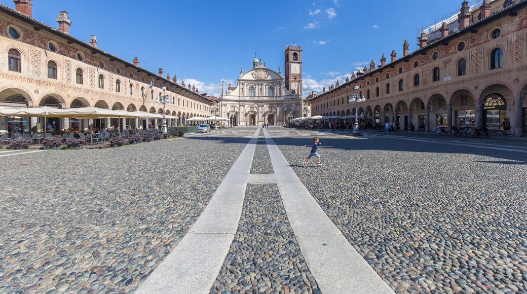 Vigevano, Italy - August 30, 2020: street view of the medieval main square in Vigevano during daylight.