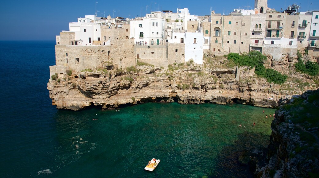 Polignano a Mare showing a coastal town and rocky coastline