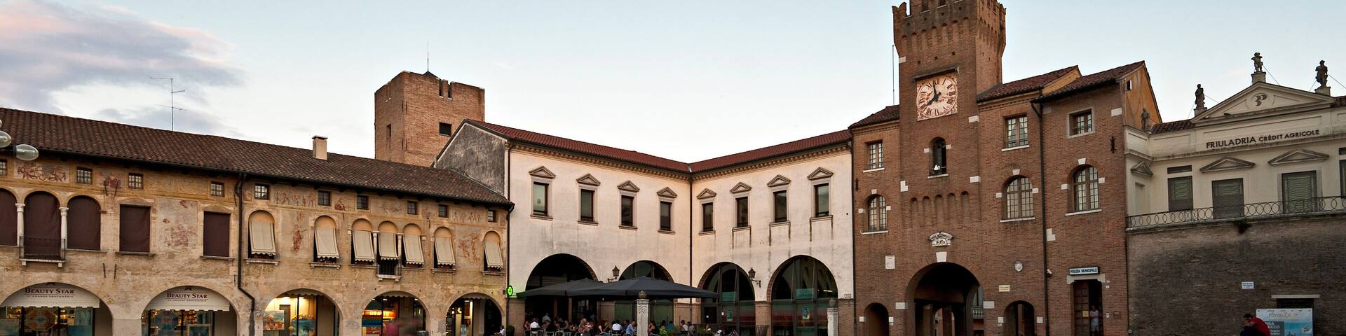 The clock tower or "Torresin" in Piazza Grande in Oderzo. Ancient city of Roman origin in the province of Treviso, Italy.