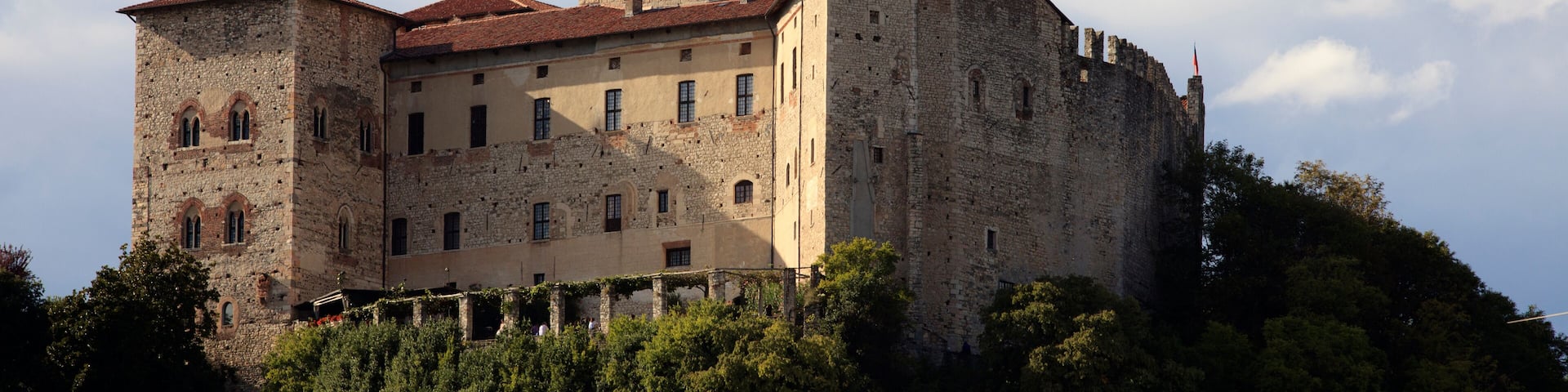 Angera (VA), Italy - September 15, 2016: View of Rocca Borromea in Angera town, Angera, Maggiore Lake, Varese, Lombardy, Italy.