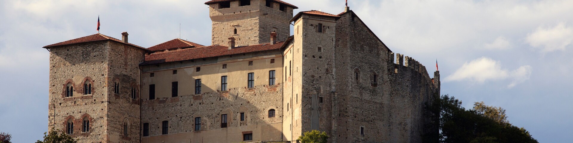 Angera (VA), Italy - September 15, 2016: View of Rocca Borromea in Angera town, Angera, Maggiore Lake, Varese, Lombardy, Italy.