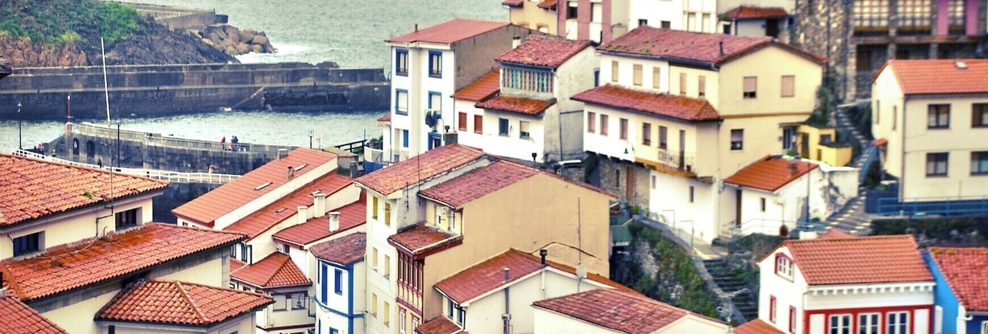 A little village in Asturias with many colourful houses down there! (And many tourists during the summer as I was told)