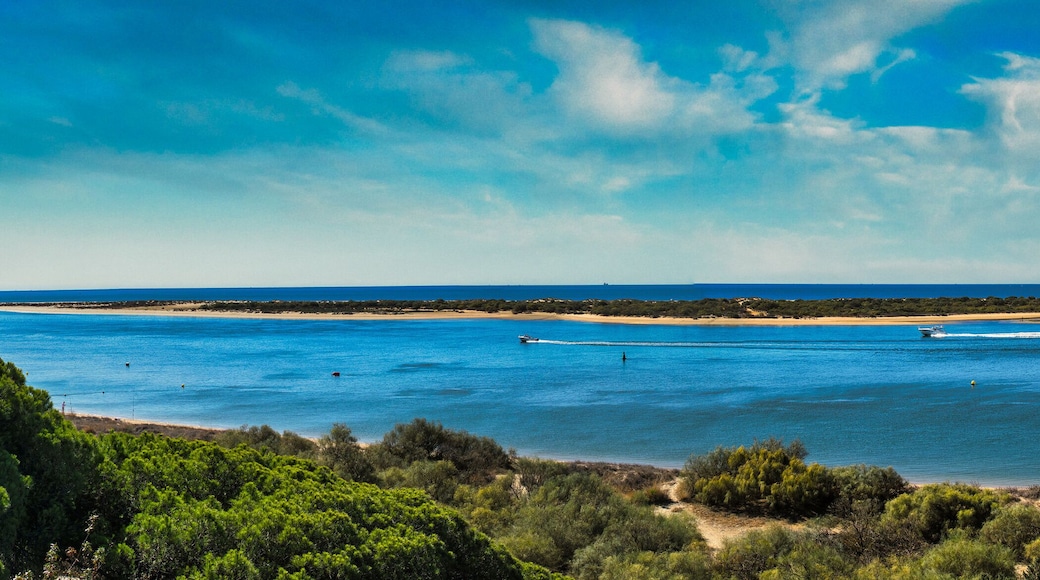 Panoramic of El Portil beach with sky clouds