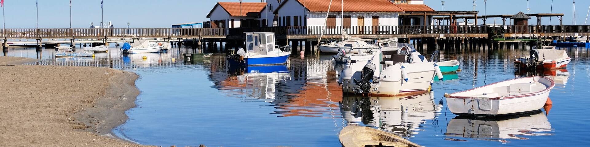 Los Alcazares beach and harbor. Fishing village on the western side of the Mar Menor in the autonomous community and province of Murcia, southeastern Spain.