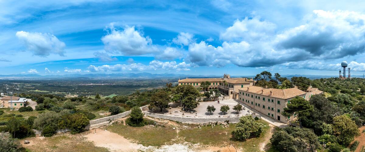 Spain, Mallorca, Helicopter panorama of Sanctuary of Cura situated on summit of Puig de Randa in summer