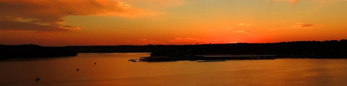 brilliant sunset in osage beach, over the water at lake of the ozarks, missouri