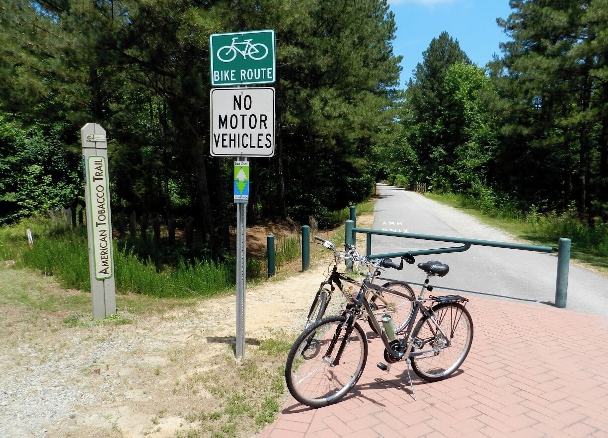 The American Tobacco Trail is a 22 mile hiking / biking trail which runs through Durham and Cary, NC.  A great place to ride in the city without traffic. 
