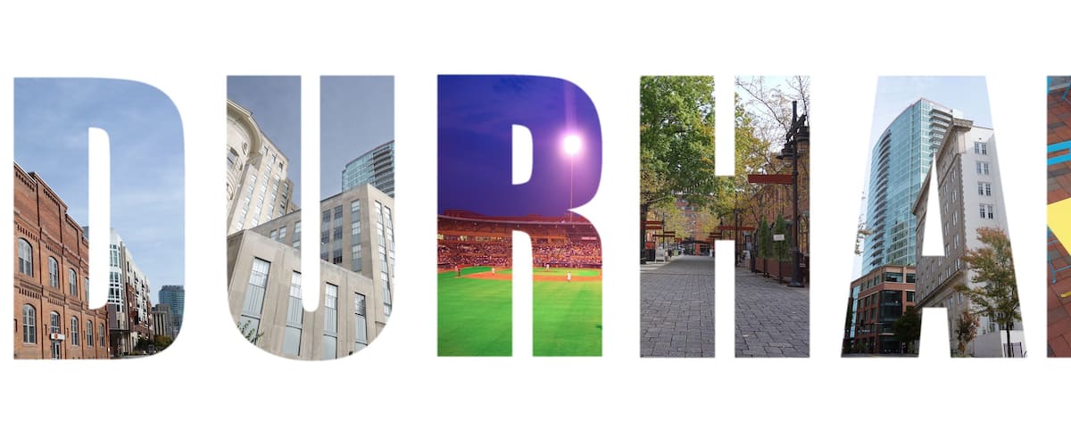 A cityscape with historic buildings, a baseball field, a pedestrian street, and modern architecture.