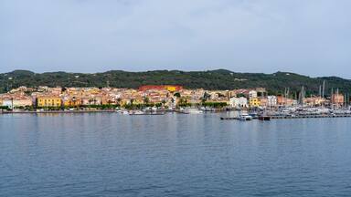 Carloforte. Sardegna. Wonderful cityscape of the town from the boat that is approaching the island. Carloforte is the main city of the San Pietro island