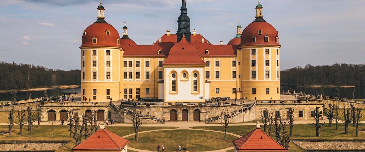 The castle lies on a symmetrical artificial island. It is named after Duke Moritz of Saxony, who had a hunting lodge built there between 1542 and 1546.