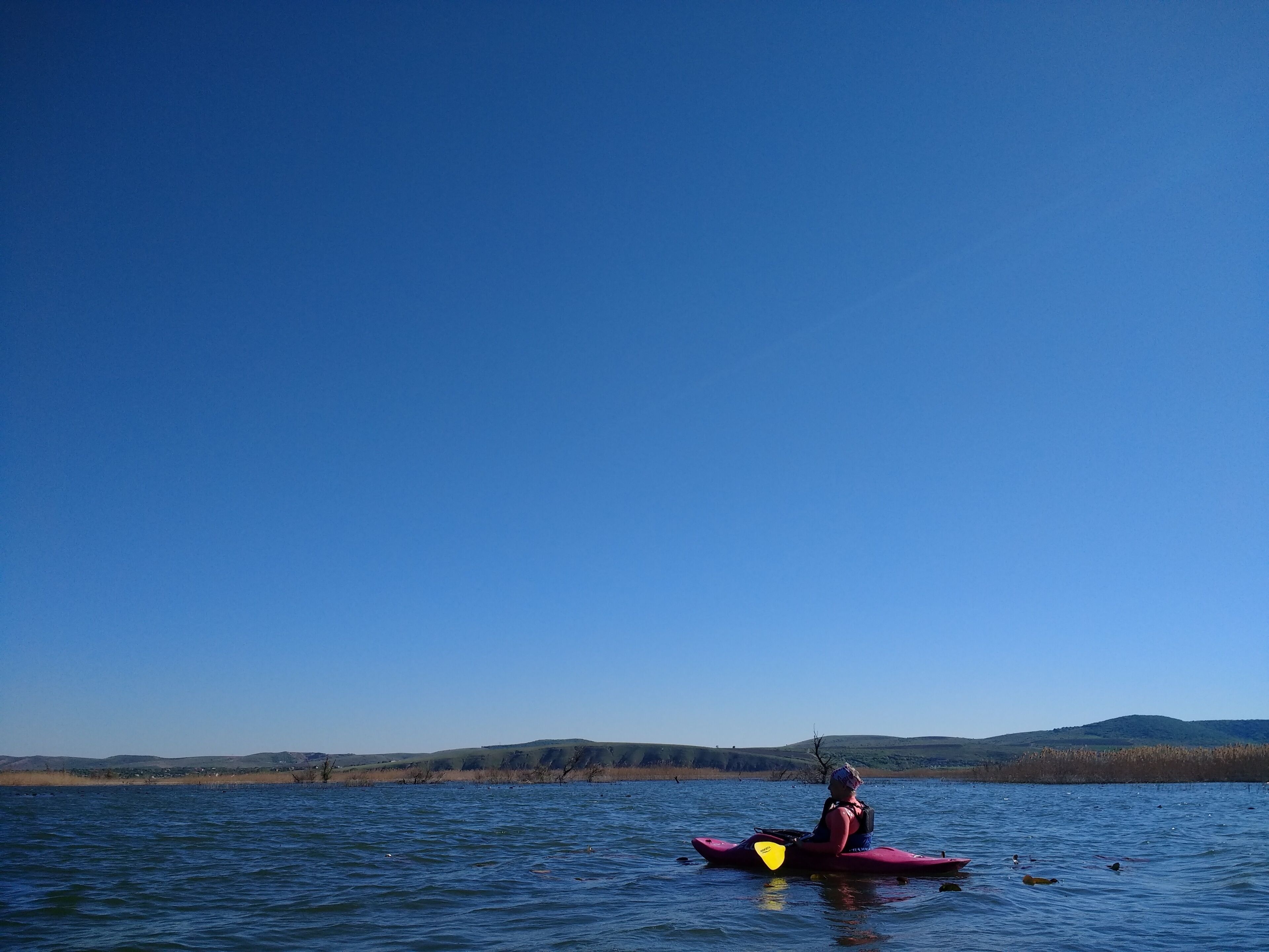 We struggled to reach this lake by our kayaks years in a row. Last spring (April 2018), the water level was high, so we managed to paddle the narrow canals and get to it.
In spite of the wind, it felt peaceful. It really did.
#waterlust #blue