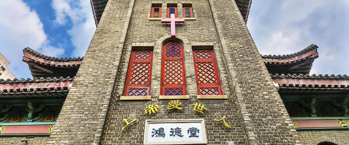 Old Hongde Tang Fitch Memorial Christian Protestant Church Duolon Cultural Road Hongkou District Shanghai China. Created 1928.  Chinese characters state Hongde Tang and God Loves All People; Shutterst