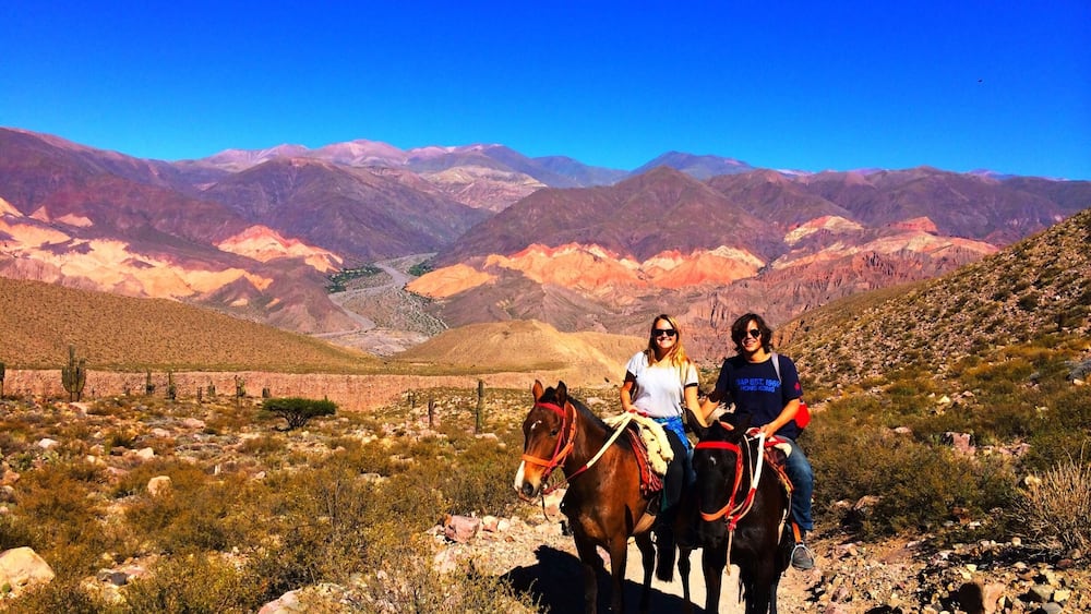 Rent a horse (& guide) to explore the area around Tilcara and admire the incredible multi-coloured mountains