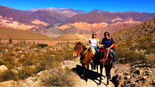 Rent a horse (& guide) to explore the area around Tilcara and admire the incredible multi-coloured mountains