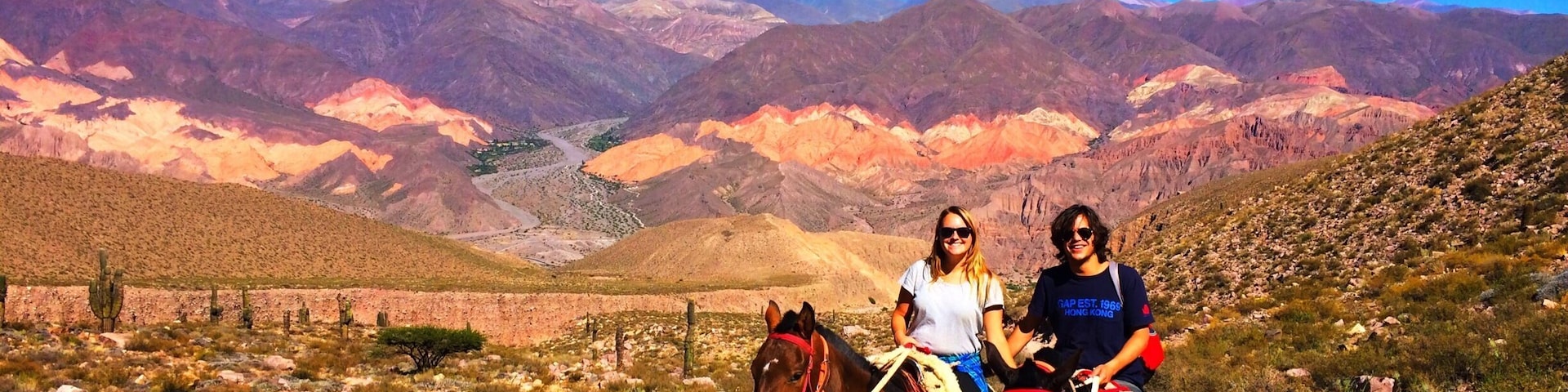 Rent a horse (& guide) to explore the area around Tilcara and admire the incredible multi-coloured mountains