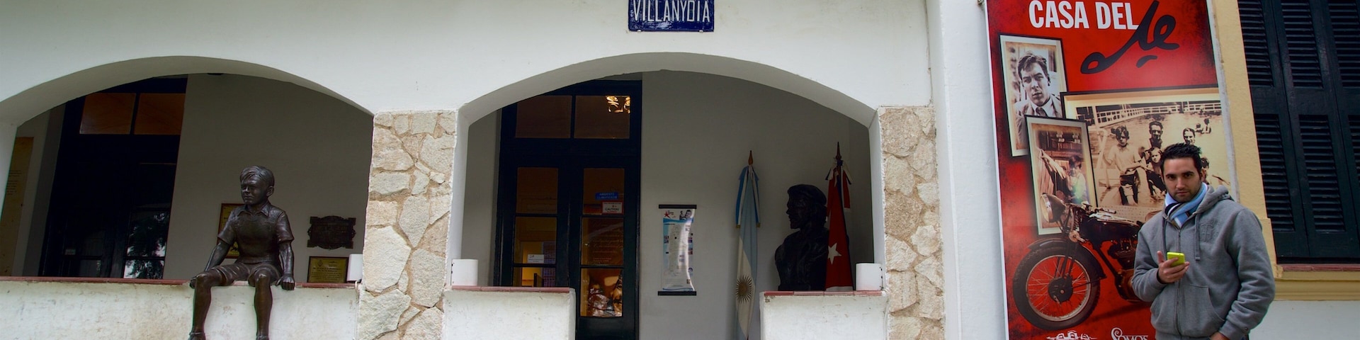 Alta Gracia which includes signage and street scenes as well as an individual male