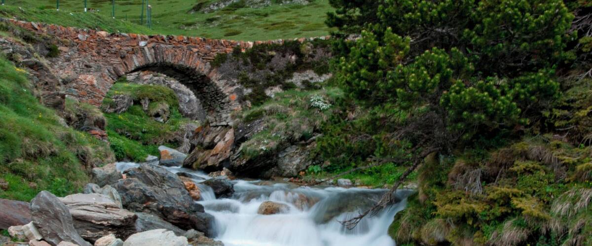 Nature and landscape high up at the mountains in the eastern Pyrenees. The air is fresh with surrounding greenery and stunning rapids. #pyrenees #spain #waterfall #nature #landscape