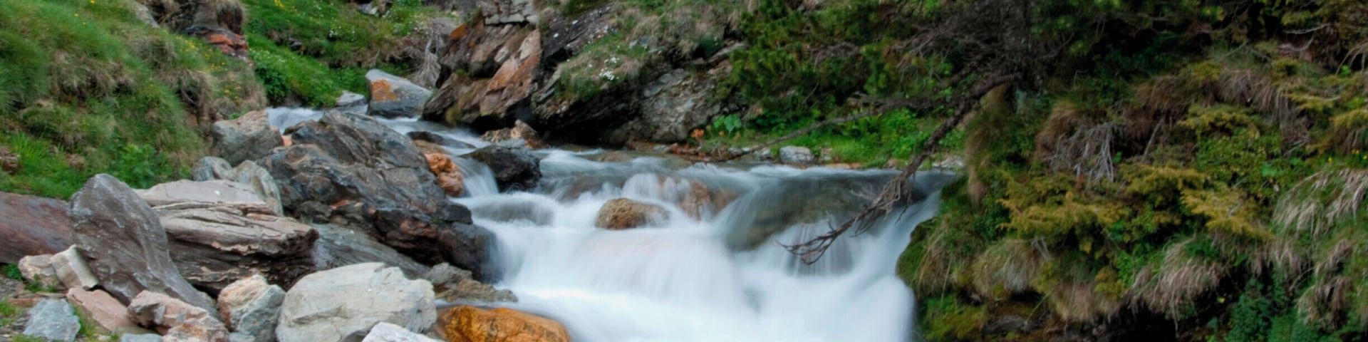 Nature and landscape high up at the mountains in the eastern Pyrenees. The air is fresh with surrounding greenery and stunning rapids. #pyrenees #spain #waterfall #nature #landscape