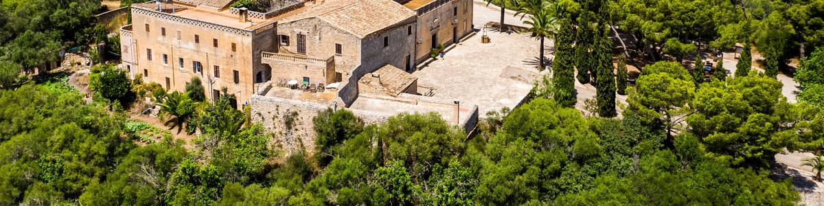 Aerial view of Santuari de Bonany Monastery amidst trees, Petra, Balearic Islands, Spain