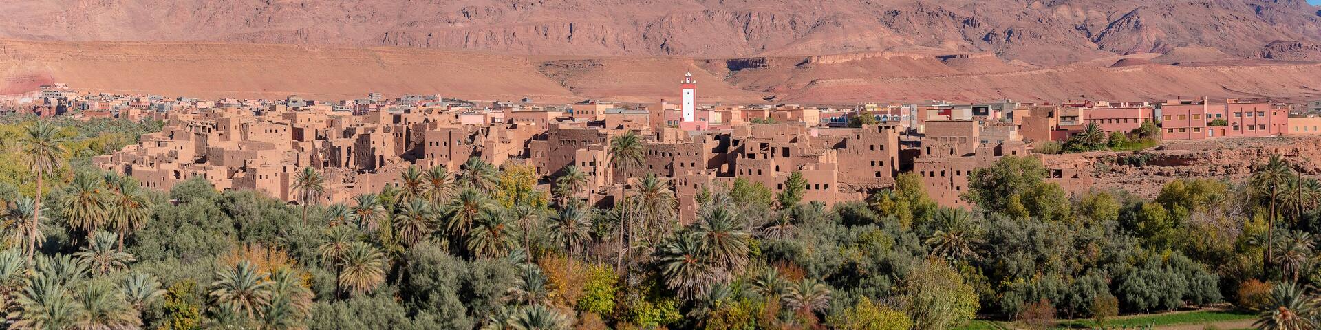 River area at M’Goun Valley – the Valley of the roses, where blossoms are harvested to make Rose Oil and other cosmetic products. Todra gorge and high atlas mountain. Berber houses