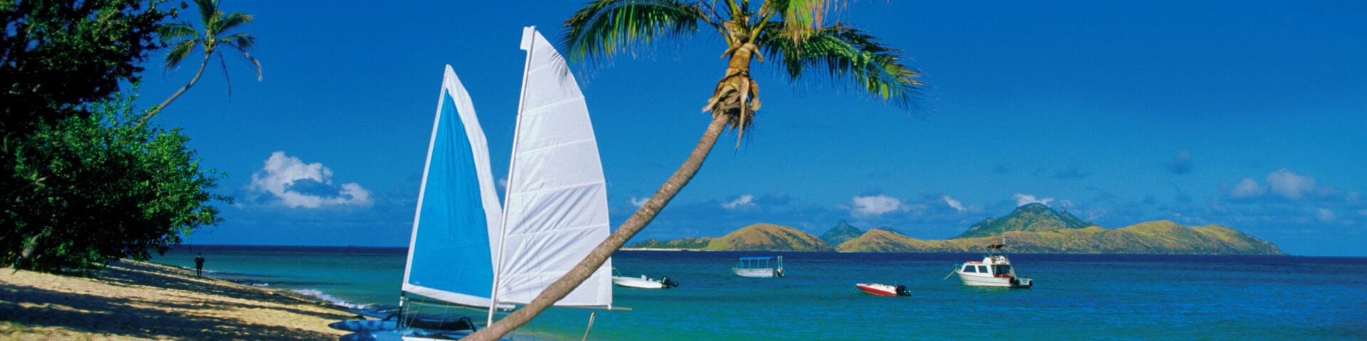 Sailboat on Mamanuca Group Resort beach, Tokoriki Island, Fiji