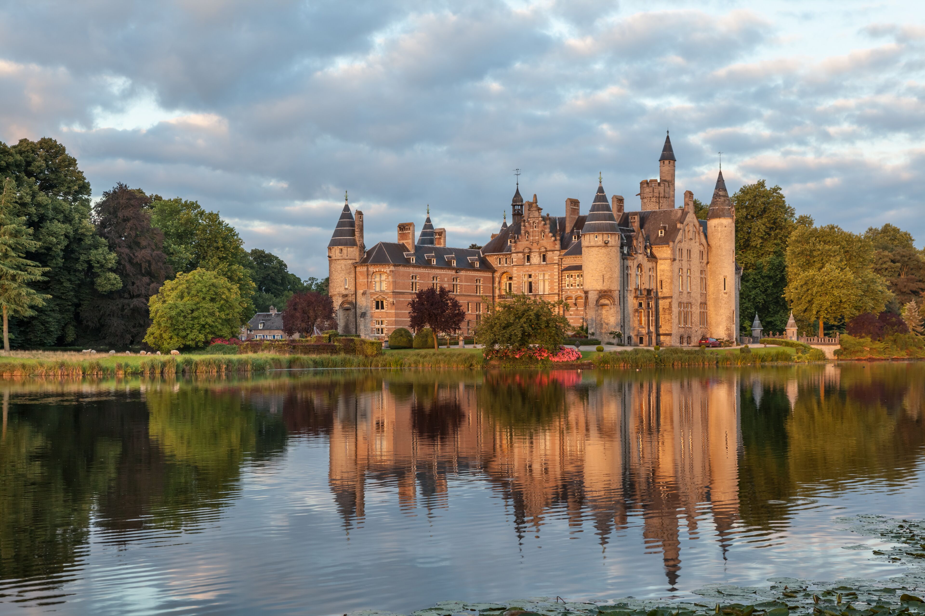 A castle with multiple towers and a moat.