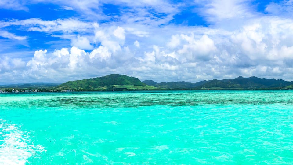 Stunning tropical scenery. Famous Blue Bay with transparent turquoise sea, popular diving spot om Mauritius island
