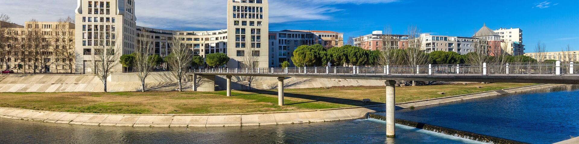Modern buildings in Montpellier by river Lez - France