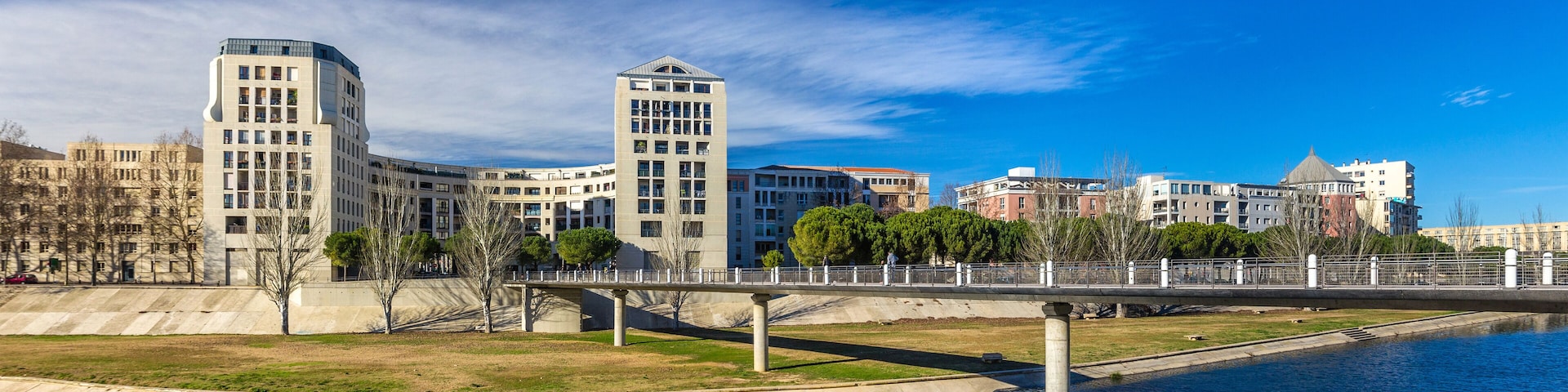Modern buildings in Montpellier by river Lez - France