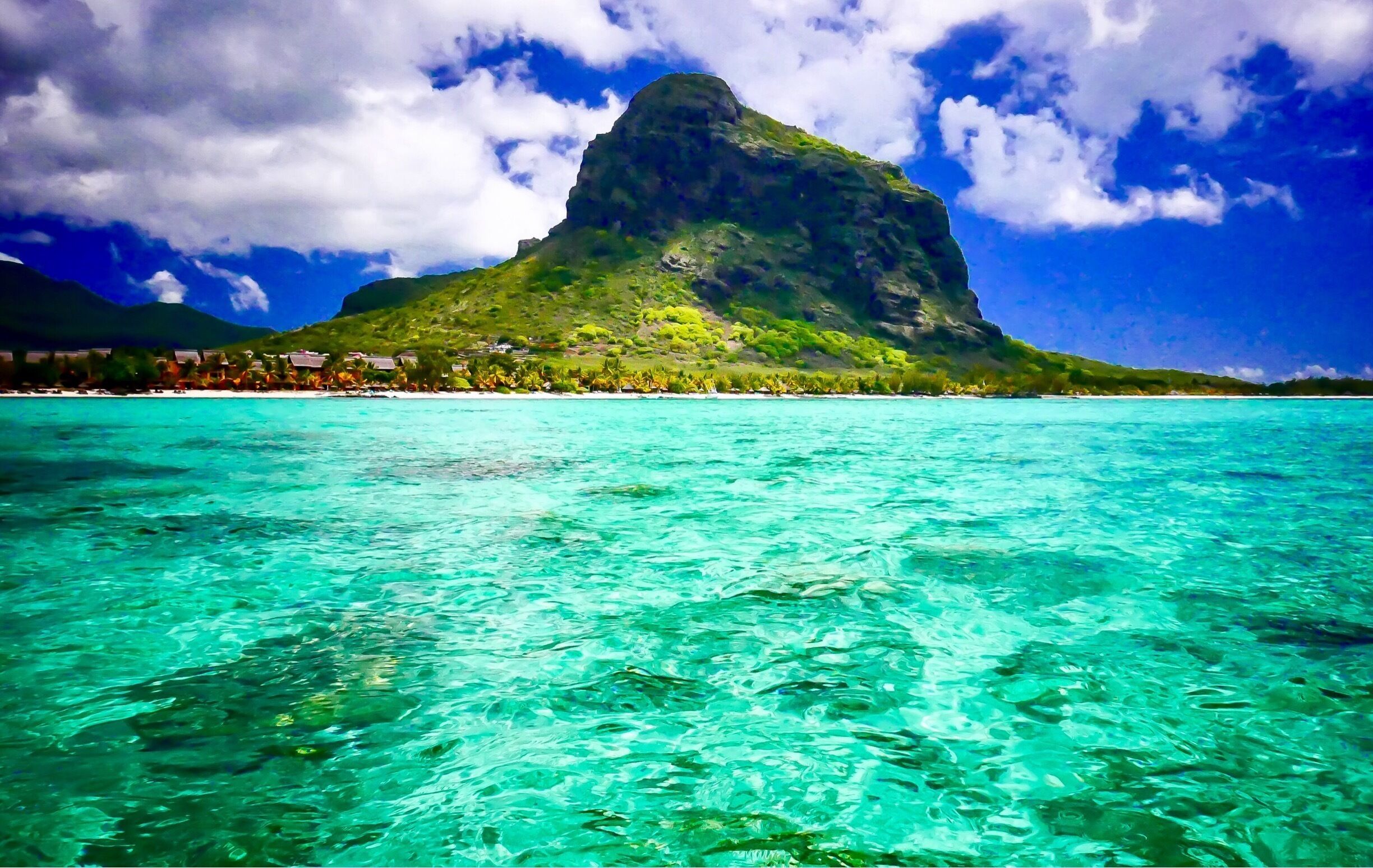 Lovely spot on the west coast, you can also climb the mountain which has spectacular views of the coast.