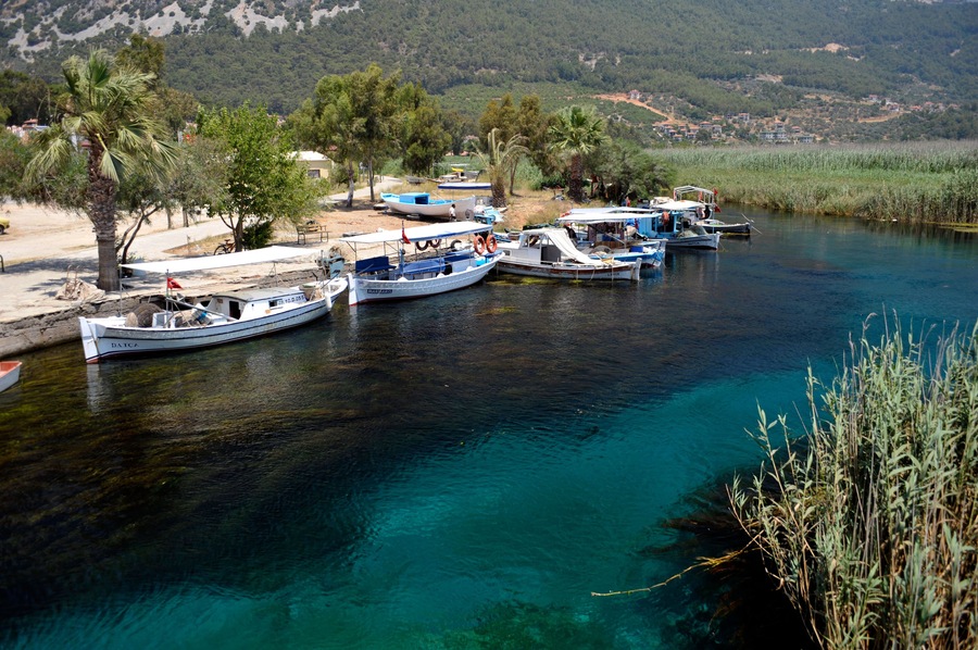 boats moored in Azmak river Akyaka Turkey