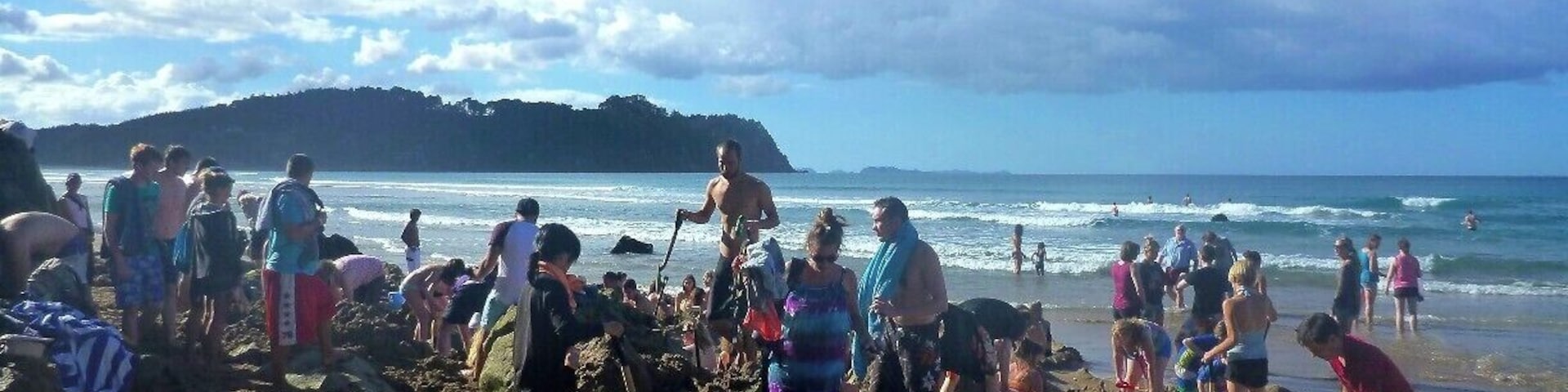 Hot Water Beach also lives up to the touristy hype. Where else in the world can you dig a hole in the sand on the beach and create your own hot pool!?
There is only a small window of time during the day when you can do this, and when this time hits the beach becomes really crowded.
It’s fun and exciting though, and with more people there are more potential hot water holes you can steal after they leave!
#beach